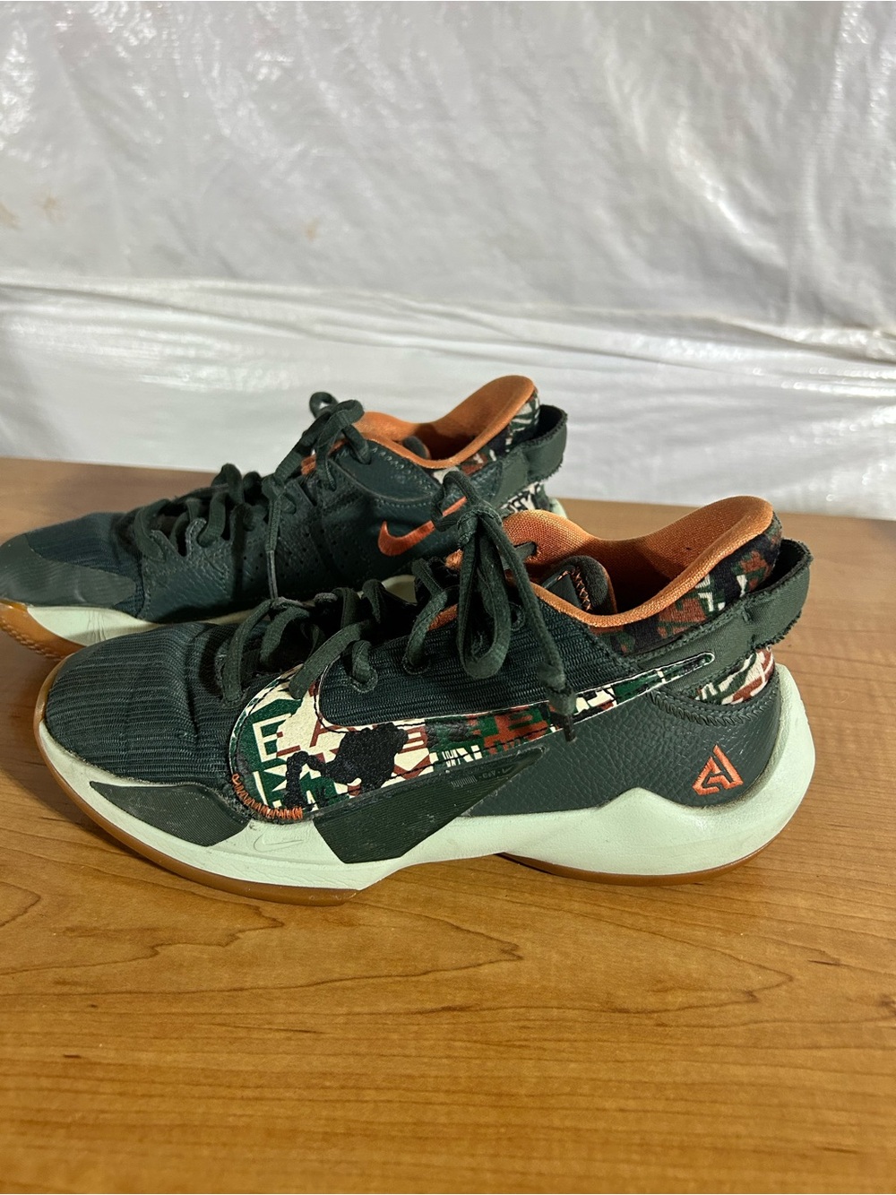 Nike Kids Low-Top Sneakers in Dark Green and Orange with Printed Accents